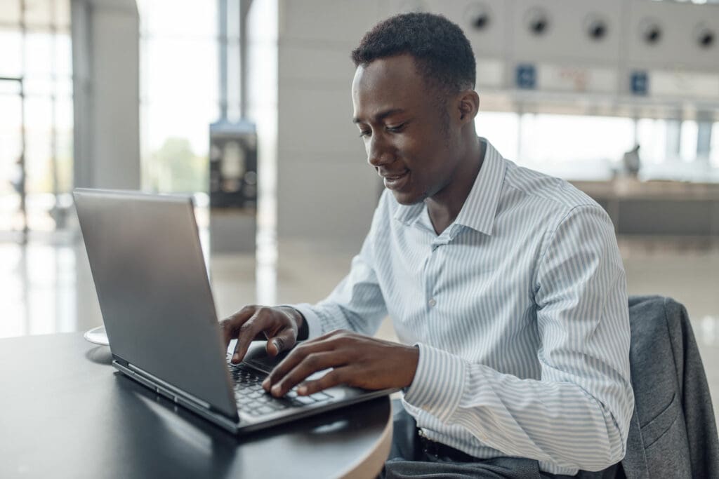 Car Salesman on laptop